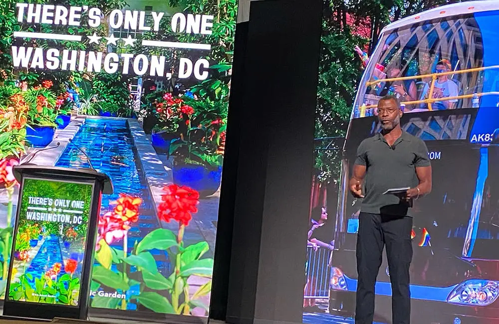 Destination DC boss: Why the travel industry should focus on the positive experiences that the USA delivers 4 Destination DC President & CEO Elliott Ferguson on stage at IPW25. Image: Cassie Tannenberg