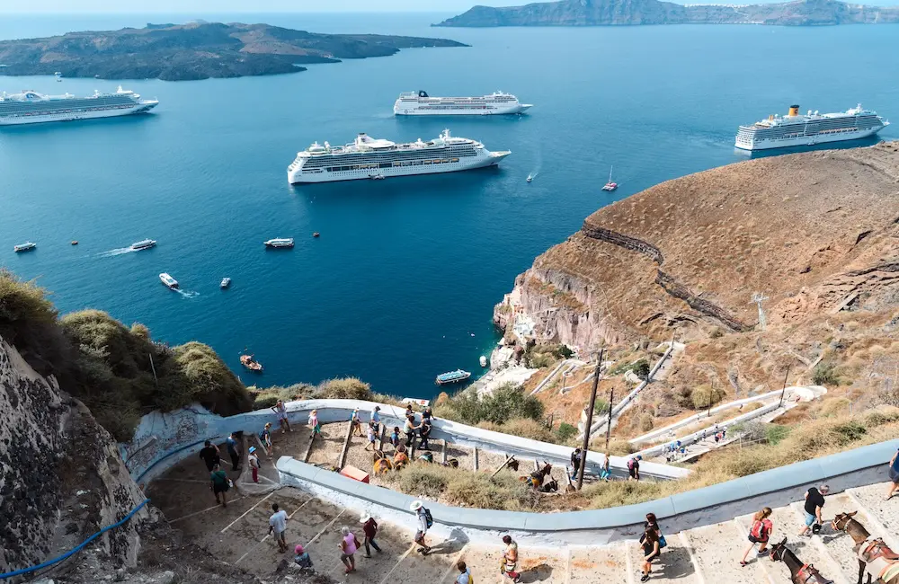 Aiming to save Santorini and Mykonos, Greece rolls out new cruise passenger tax 2 Cruise ships in Santorini.