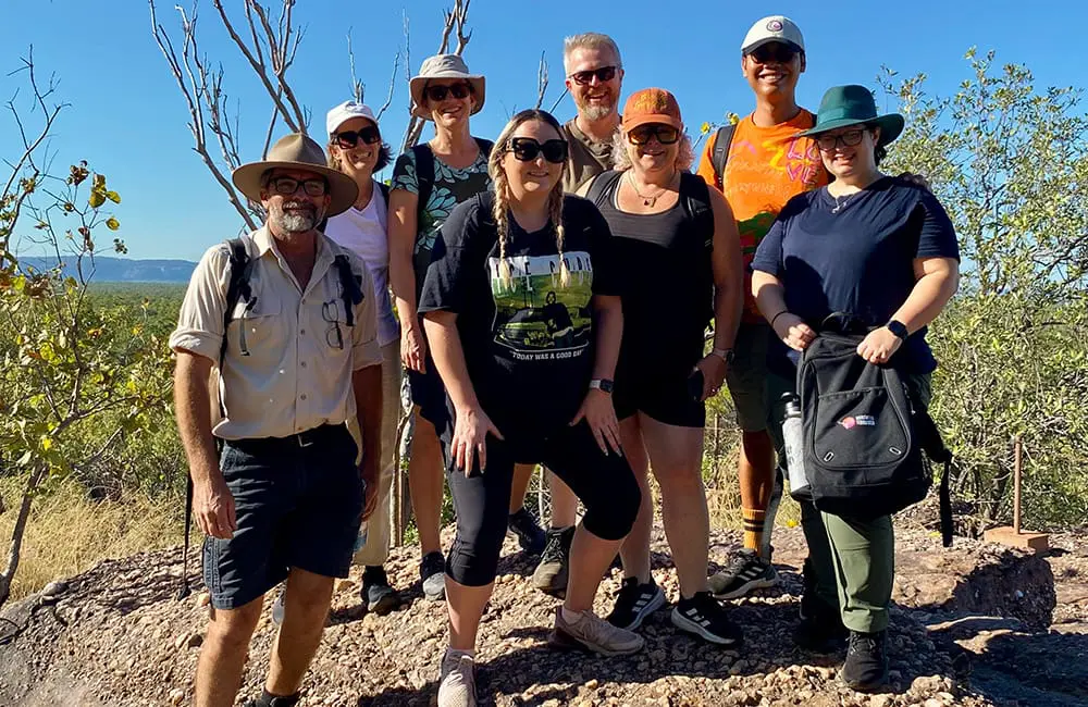 NT rolls out first-ever Aboriginal Tourism Product Awareness Program famil 2 Tourism NT ATPAP group with Offroad Dreaming’s Neville Beeby (left) at Burrungkuy (Nourlangie). Image: Tourism NT