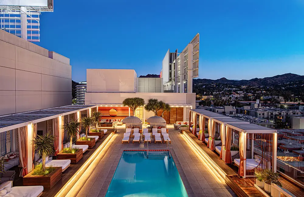 Win a spot! Viva Holidays, United Airlines & LA Tourism team up for 2025 agent famil incentive 1 W Hollywood pool area at night – Ultimate Los Angeles Famil incentive