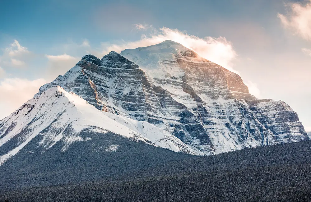 Karryon Into the Hearts of Canada Podcast: Ep 1: Leslie Bruce, Banff and Lake Louise Tourism 2 Banff Mt Temple EpicTrails_Heliconia_LukaszWarzecha