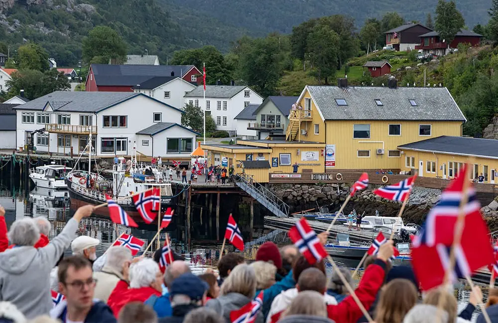 An antidote to overtourism: Hurtigruten’s Community-Centred ‘Open Village’ cruises 3 CREDIT - Hurtigruten Open Village Concept - Warm Welcome Bessaker - Photo, Michel Afflerbach, Hurtigruten