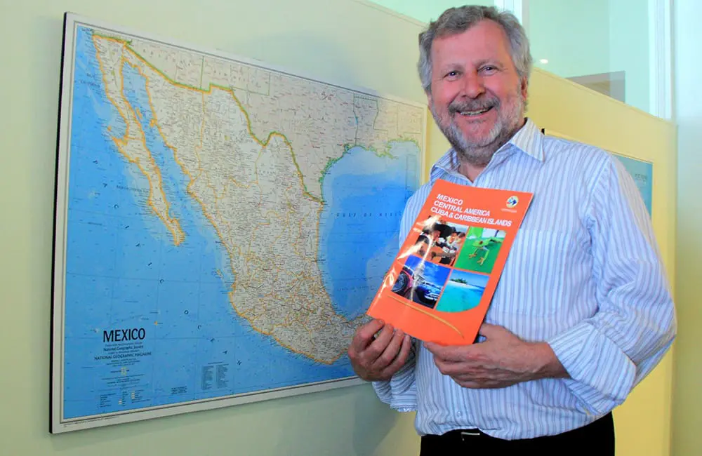 Movers + Shakers: Contours Travel Founder Ted Dziadkiewicz steps down after 50 years 1 Contours Travel Founder Ted Dziadkiewicz with a Central America brochure in 2009.