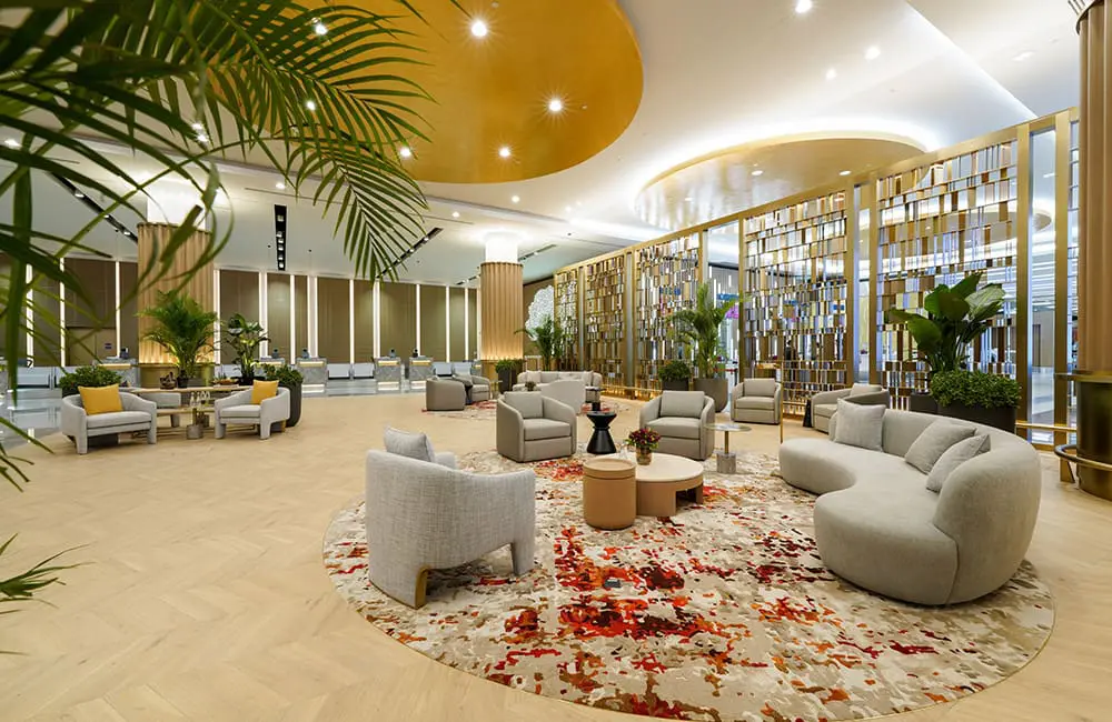 Elevated experience from check-in to lounge to cabin: Emirates First debuts at Dubai Airport 3 Seating area at Emirates First check-in area at Dubai International Airport.