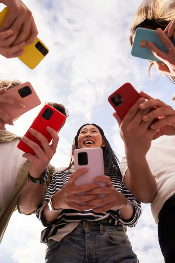 AI takes the lead: 1 in 2 Gen Z Aussie travellers let robots plan their trips 1 Portrait shot of Gen Z travellers using AI on smartphones. Image: Shutterstock