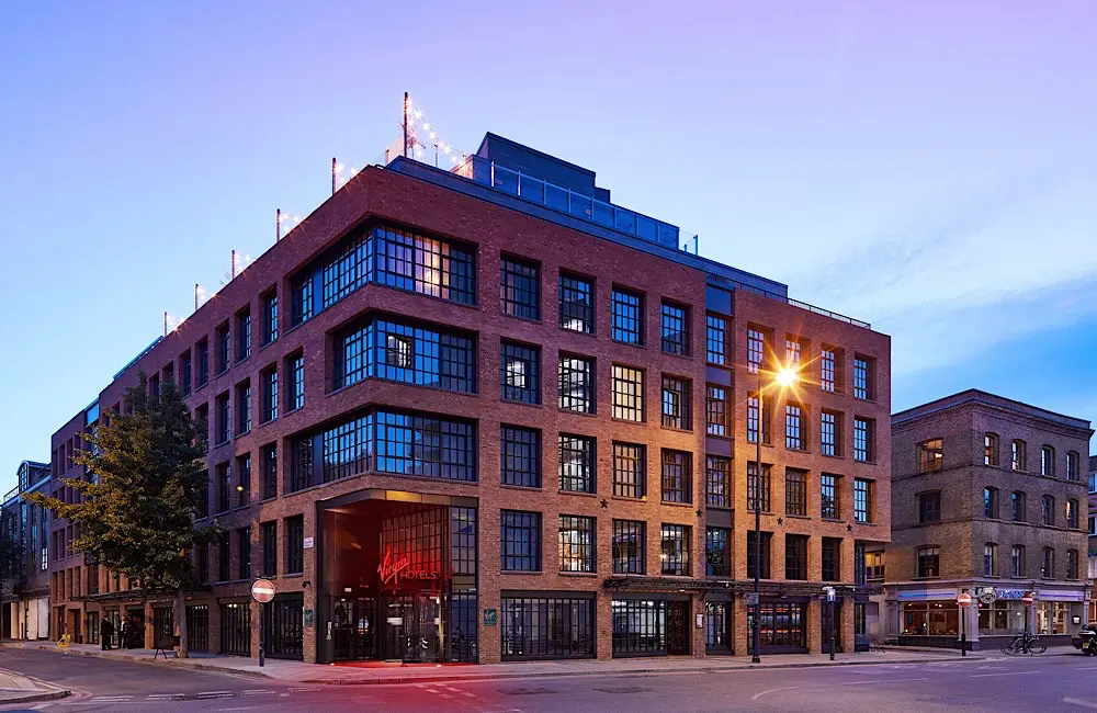 HOTEL REVIEW: Inside Virgin Hotels London, where staying in feels like going out 1 Brick, glass and neon: Virgin Hotels London stands proud at the corner of comfort and cool.
