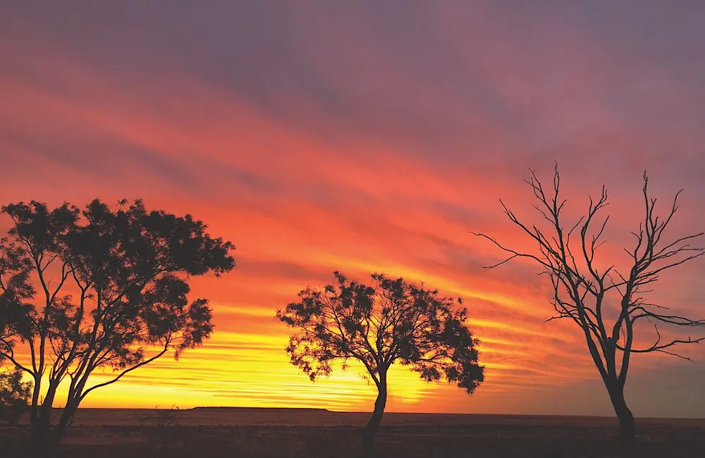 Back the bush: Helloworld, VIVA Holidays and OQTA launch Outback Queensland recovery campaign 3 Sunset over the Outback: Campaign packages like the Glamping Getaway include immersive evenings by the firepit under skies like this.