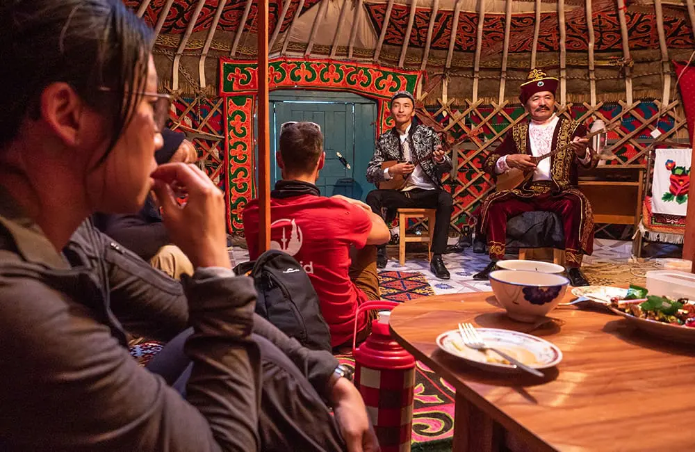 Intrepid Travel expands trip range after Aussie travellers stan this lesser-known Asian region 4 Listen to traditional music over dinner in Ulgii, Mongolia. Image: Intrepid Travel