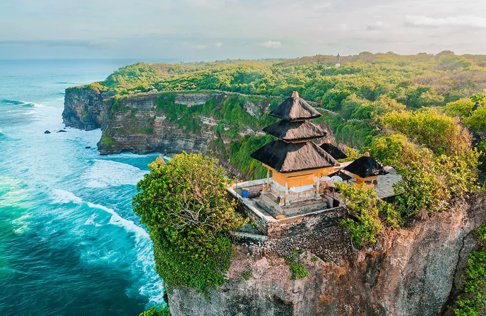 Beach-bound Aussies: Family travel surge forecast for Thailand & Bali this summer 1 Aerial image of temple in Bali, Indonesia – Aussie family travel trend. Image: Luxury Escapes