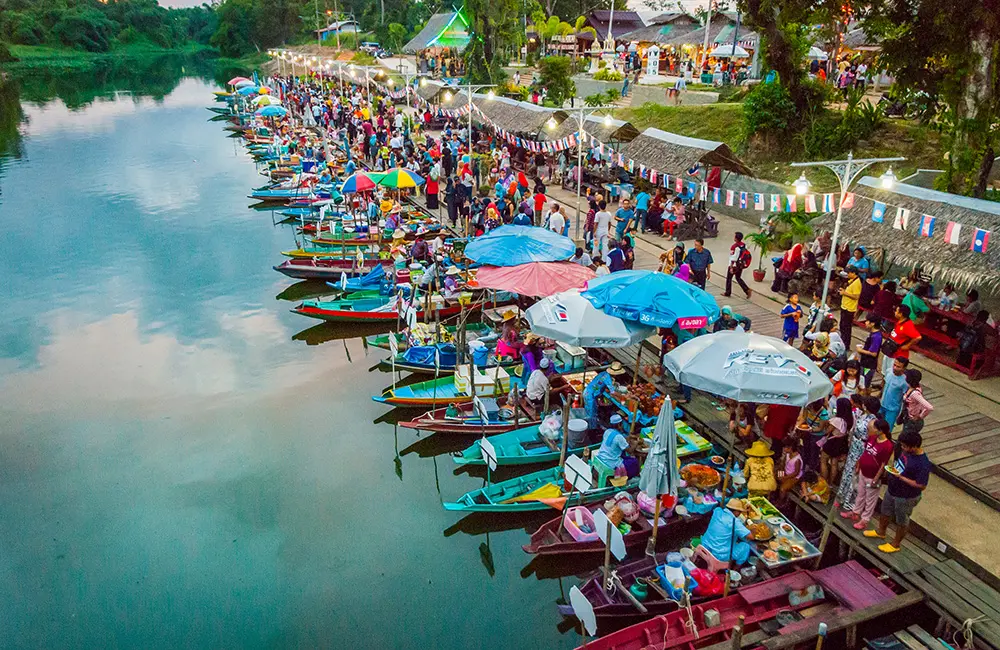 Revealed: The cheapest Asian hotspots to escape an Aussie winter with stays under $145 2 Colourful evening floating food markets in Hat Yai, Thailand.