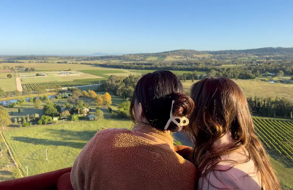 More Zen, less stress? Wellness wave ushers new 'era of enrichment' for Aussie tourism 2 Two women in Balloon Aloft hot-air balloon experience over Hunter Valley, NSW. Image: Tim Harrison