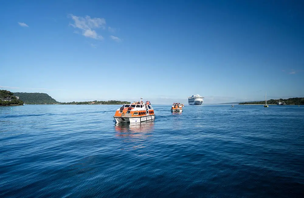 Welkam! Port Vila greets first cruise ship in 8 months after December 2024 quake 5 Tender boats taking passengers from Carnival Adventure cruise ship.