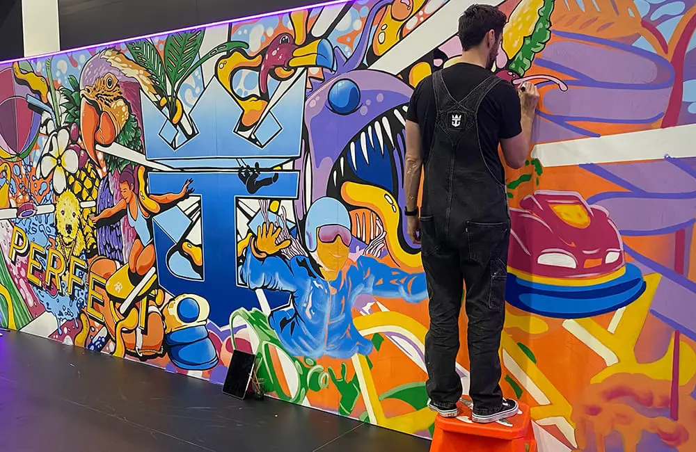 Cruise360 2025: Biggest cruise industry gathering held in this region kicks off in Brisbane 9 RCI mural at Cruise360 2025 tradeshow. Image: Cassie Tannenberg