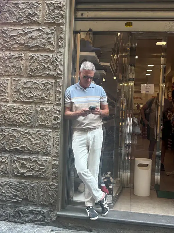 What Australian advisors can learn about US luxury trends from America’s largest travel company 4 Darren Wright in a shop doorway in Florence, Italy. US luxury travel trends Image: Supplied