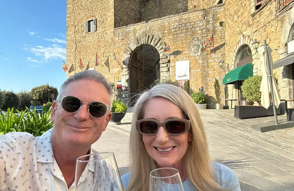 What Australian advisors can learn about US luxury trends from America’s largest travel company 1 SixP's Wright and Cavallin – a couple with wine glasses at Castiglion Fiorentino in Tuscany. US luxury travel trends Image: Supplied
