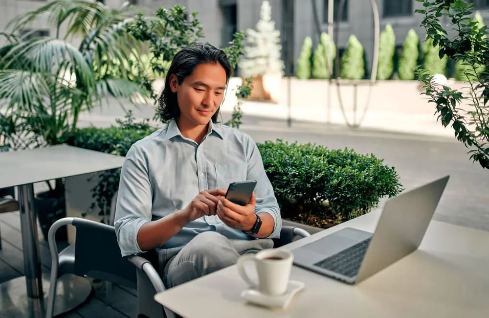 This APAC capital ranks as world’s best workation city for bleisure travellers in 2025 4 Male digital nomad working from cafe. Image: Shutterstock