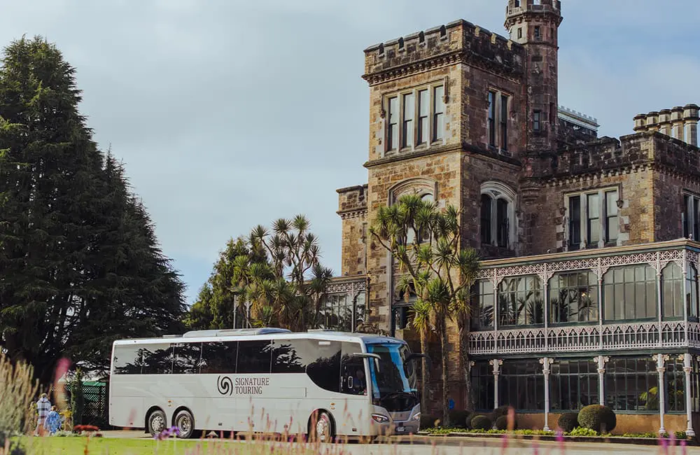 Journey Beyond makes first international move with NZ’s Grand Pacific Tours purchase 2 Grand Pacific Tours Signature Mid-Size group tour coach at Lanarch Castle. Journey Beyond portfolio