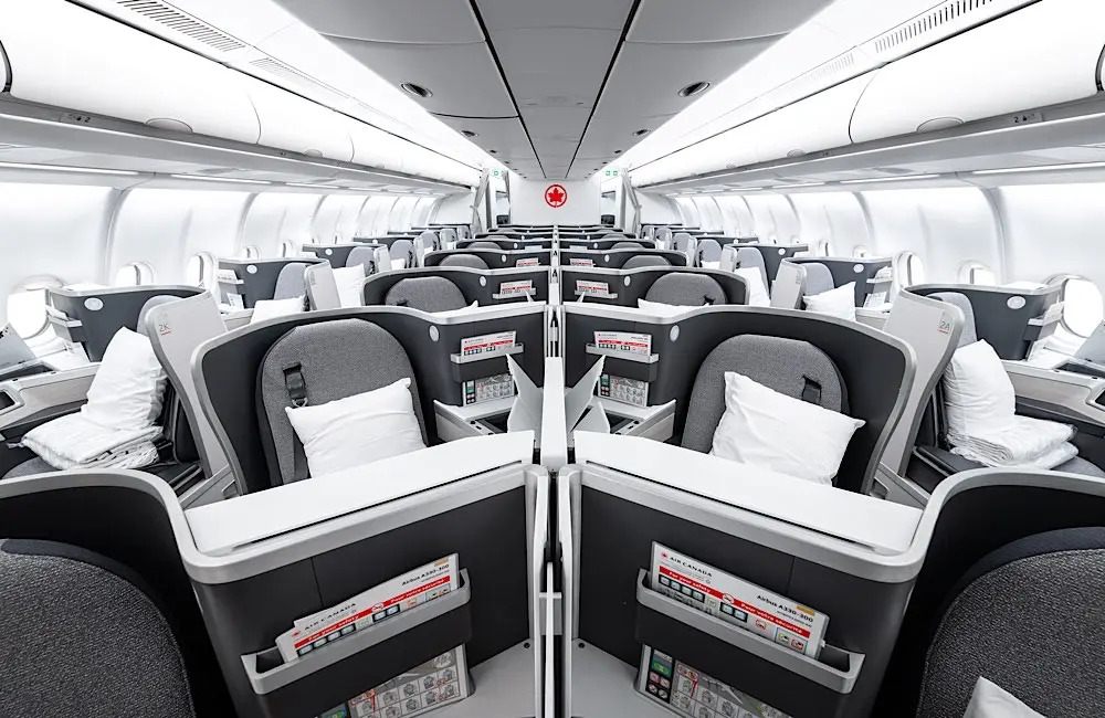 Signature Class Flight Review: Air Canada AC33 Vancouver to Sydney and the long‑haul dilemma of sleep or story 2 Air Canada’s Signature Class in 1-2-1 configuration: every seat has direct aisle access and converts to a fully flat bed. Image: Air Canada