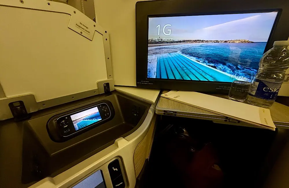 Signature Class Flight Review: Air Canada AC33 Vancouver to Sydney and the long‑haul dilemma of sleep or story 4 Signature Class pod with 18-inch screen and handheld remote: the setup makes watching Air Canada’s award-winning inflight entertainment feel like a film festival at 38,000 feet.