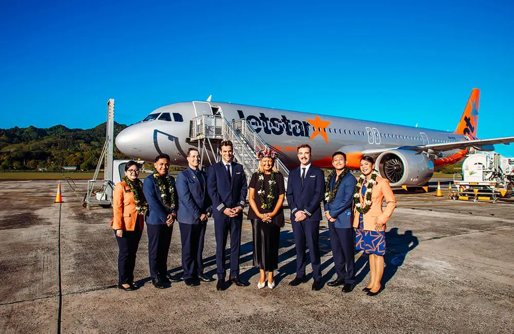 Jetstar starts first-ever flights from Brisbane to this South Pac paradise in May 2026 3 Jetstar Group CEO Stephanie Tully with JQ crew at Rarotonga International Airport.