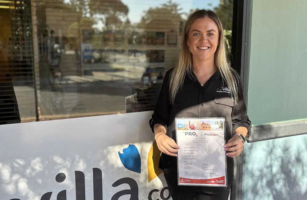 Travel’s next gen: 20 new agents fast-tracked for success in ProStart novice training program 3 Hannah Earley from Villa - Holiday Your Way holds her ProStart certificate outside the Busselton store in WA