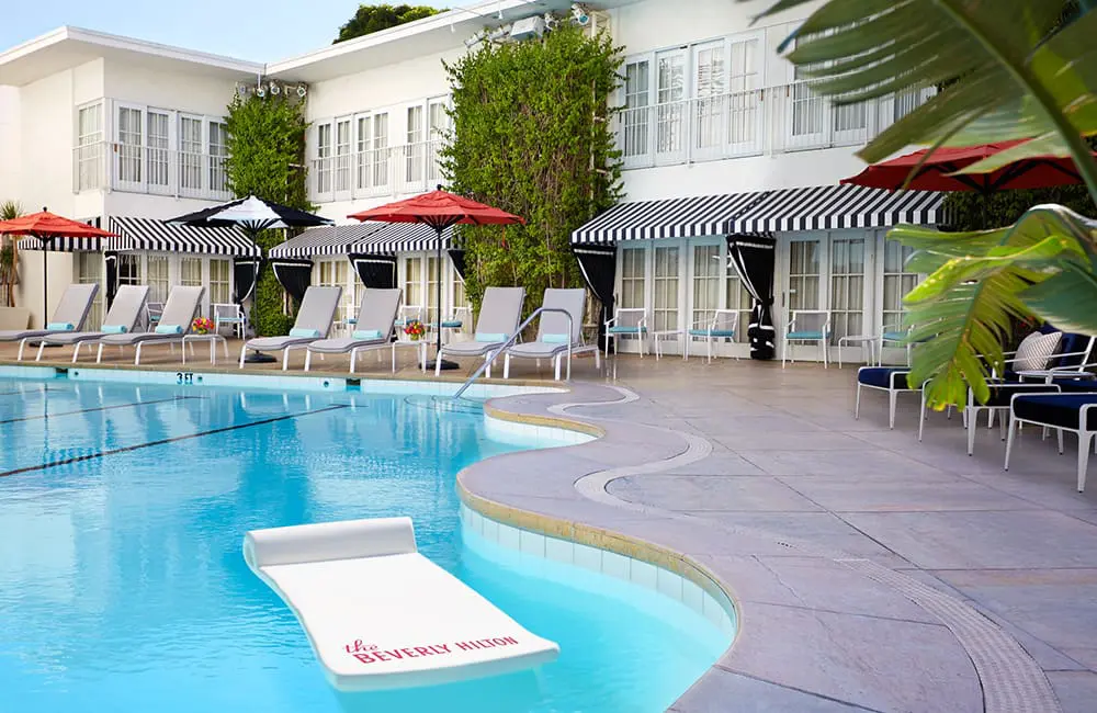 Golden Globes to glam: The Beverly Hilton unveils top-to-toe makeover for 70th anniversary 3 Render of The Beverly Hilton hotel pool. Image: One Beverly Hills