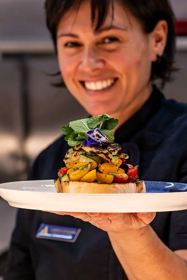 Australia’s first airport resort gets a glow-up with new villas, exec suites and boho vibes 3 Poolhouse Bar & Kitchen head chef Laurence Lochouarn with dish at Darwin Airport Resorts.