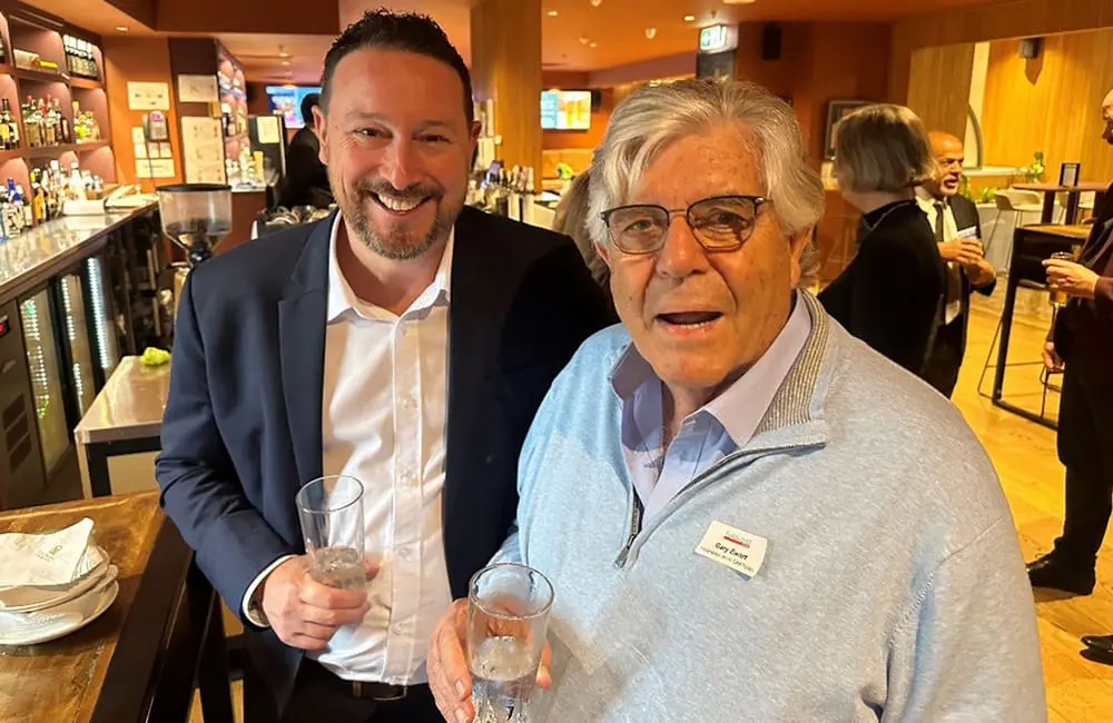 Helloworld Carousel welcomes fresh leadership and farewells a retiring industry icon 2 Helloworld Travel Group General Manager Retail Networks Nick Sutherland with Gary Ewart at event.
