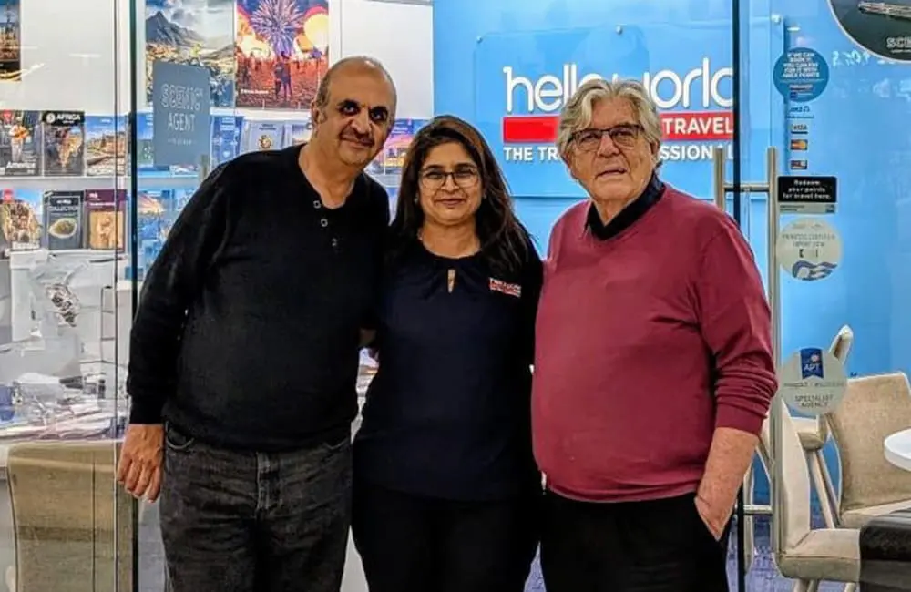 Helloworld Carousel welcomes fresh leadership and farewells a retiring industry icon 1 Helloworld Travel Carousel owners Heetesh and Anusha Chhotubhai with retiring owner Gary Ewart.