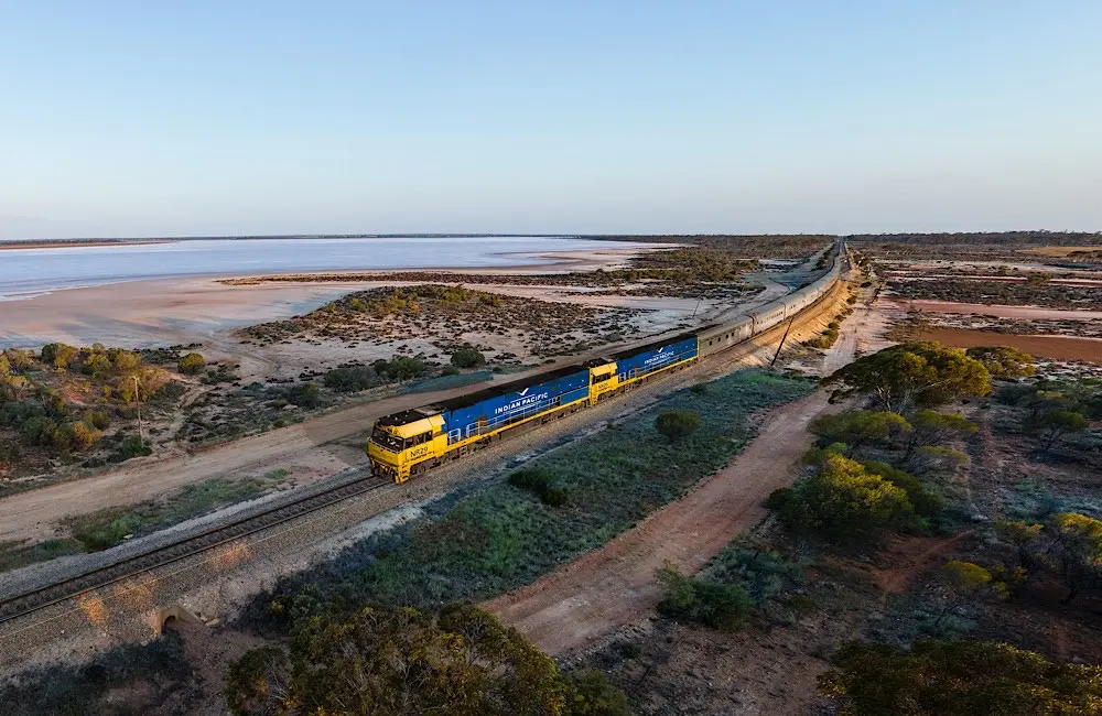 Beyonder belief: Journey Beyond’s $20K mega famil is back! 3 The Indian Pacific passing Lake Julia – another iconic Journey Beyond rail experience.