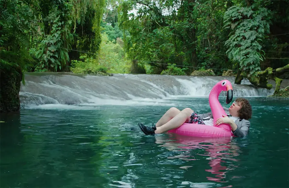 Vanuatu issues 'The Wake-Up Call': New campaign challenges Aussies to ditch routine for island adventures 2 Ray O'Leary swimming at Eden on the River, Efate. Image: Vanuatu Tourism Office