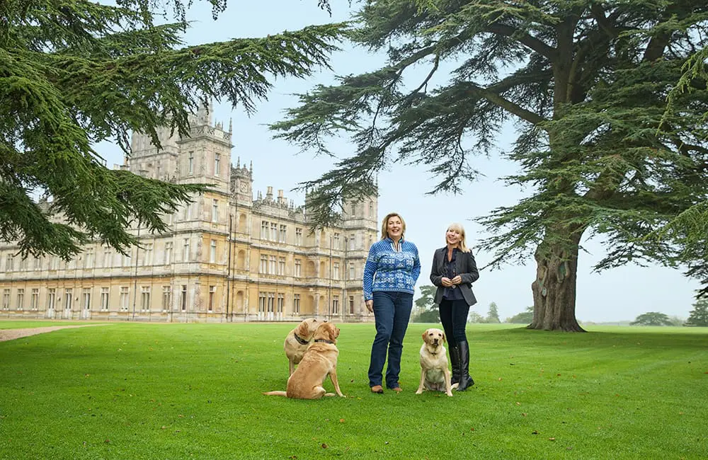 Set-jetting in style: Viking spotlights real-life Downton Abbey castle connection at exclusive Australian film premieres 2 The Countess of Carnarvon with her dogs and Viking's Karine Hagen at Highclere Castle. Image: Viking