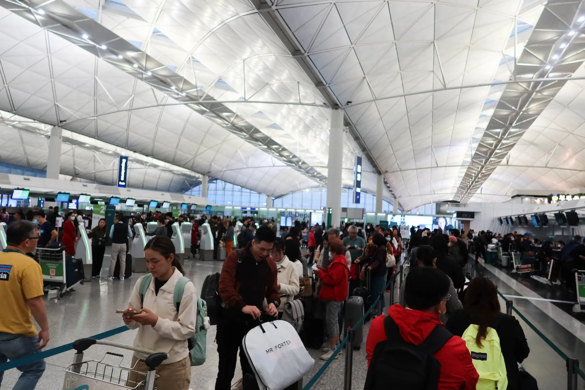 Karryon Top 10 stories of the week: Catch up on our most-wanted: Sep 26 3 Hong Kong International Airport- 15 March 2024: tourists queuing for check in luggage in airport counter