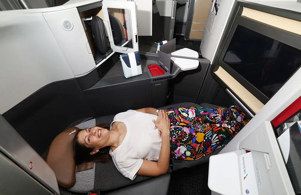 American Airlines' new-to-Australia redesigned B787-9 aircraft is now flying to Brisbane. Here’s what’s on board 2 Lying in American Airlines B787-9P Flagship Suite lie-flat seat. Image: BNE/AA