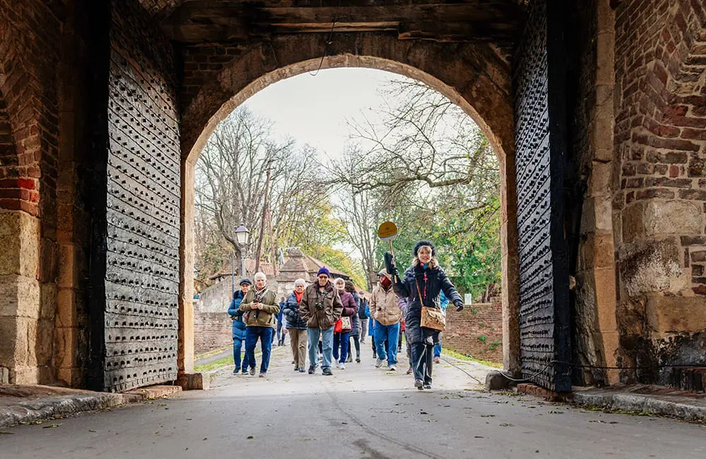 Beyond the banks: How AmaWaterways is redefining European river cruising through culture and connection 2 Tour group with guide at Kalemegdan Fortress in Belgrade. Image: AmaWaterways