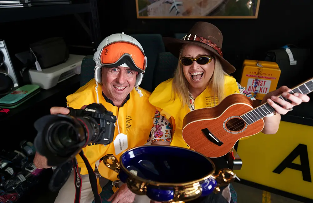 Karryon Top 10 stories of the week: Catch up on our most-wanted: Oct 17 10 A man and a woman wearing and holding lost property items for the Brisbane Airport annual auction.