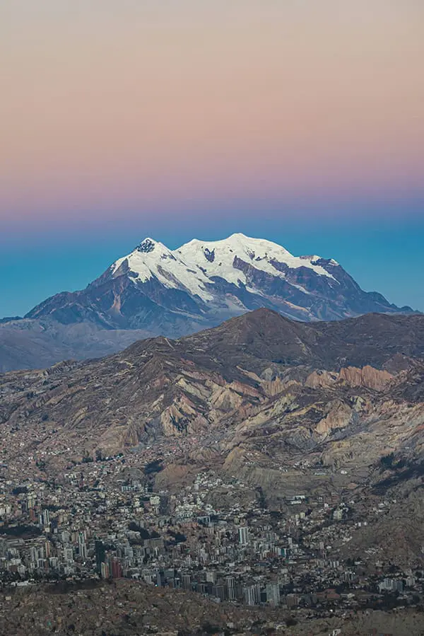 Abercrombie & Kent grows DMC portfolio to 83 countries with Crillon Tours acquisition in Bolivia 3 La Paz city with the Illimani Mountains in Bolivia. Image: Luke Thornton/Unsplash