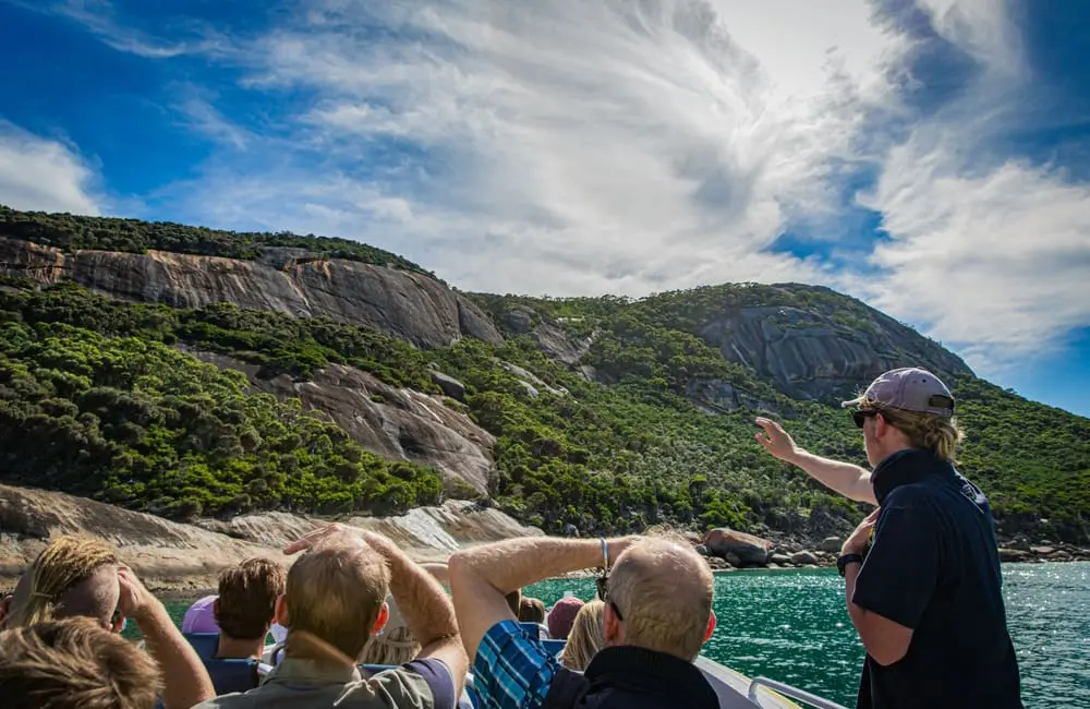 1 in 3 global jobs by 2035 powered via travel – but WTTC warns of massive workforce gap 2 Tour guide with group on cruise.