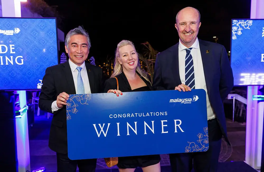 Relaunched flights & new connections: Brisbane Airport celebrates Malaysia Airlines' imminent return 5 A Flight Centre consultant won the major prize of Business Class flights.