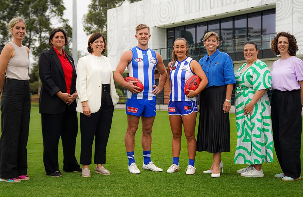 Kicking sustainable goals: Intrepid Travel plays on as North Melbourne club partner for two more years 1 Intrepid Travel and North Melbourne teams at the club partnership announcement in March 2025, including Intrepid Travel VP Marketing USA Louise Laing, NMFC President Dr Sonja Hood, NMFC AFL Midfielder Luke Parker, NMFC AFLW Defender Nicole Bresnehan, NMFC CEO Jen Watt & Intrepid Travel Chief People & Purpose Officer Meegan Marshall.