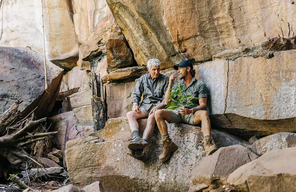All-inclusive: Outback Spirit’s 2026 tours now come with free flights for a limited time 3 Two men at Bunjani Little Mertens Falls in the Kimberley. Image: Outback Spirit