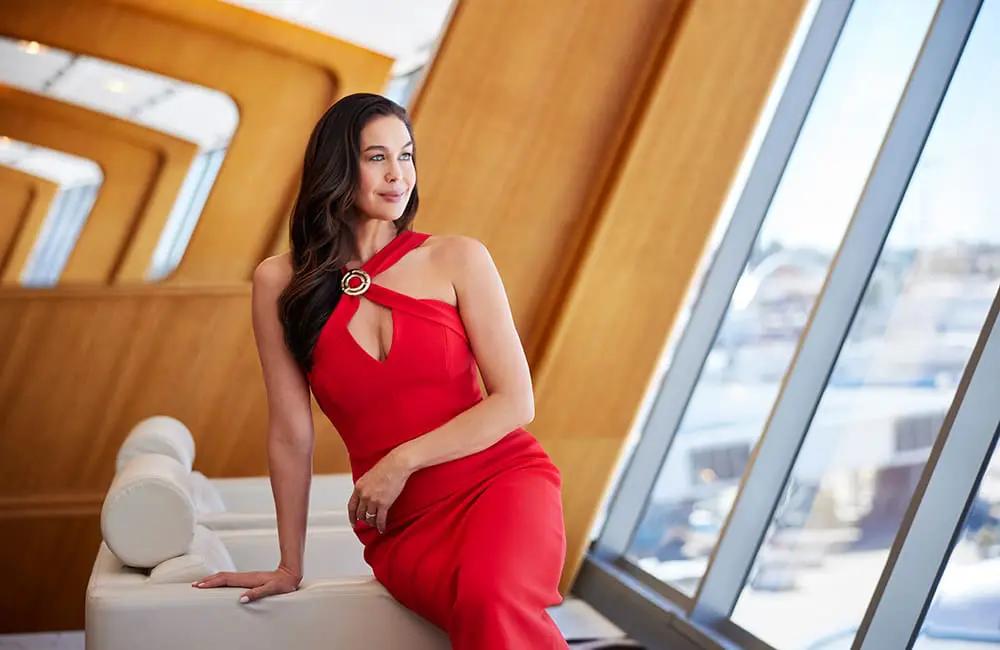 Runway to runway: Qantas & DJs take loyalty relationship to the next level at high-fashion Sydney event 3 Megan Gale in the Qantas First Class Lounge in Rebecca Vallance red dress.