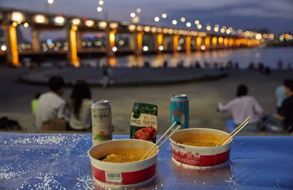 Slay all day: KPop Demon Hunters casts a spell on Aussie families with record travel to South Korea 3 Cup noodles at Han River in Seoul, South Korea.