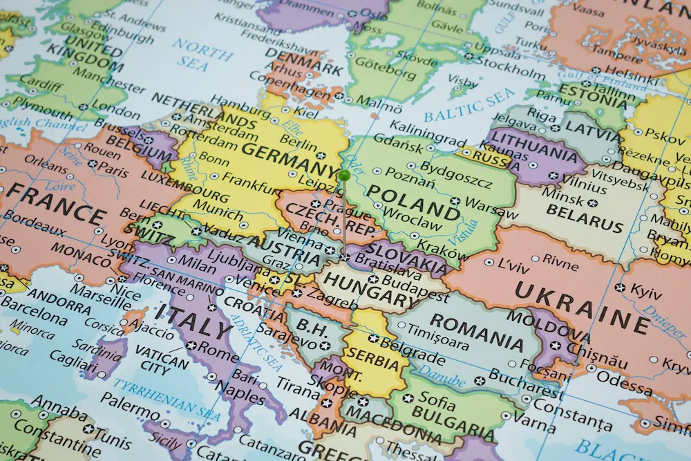 New way to enter and exit Europe starts on Sunday for Australian travellers 2 Close up to a Bratislava city with a green pin needle into Slovakia country political map