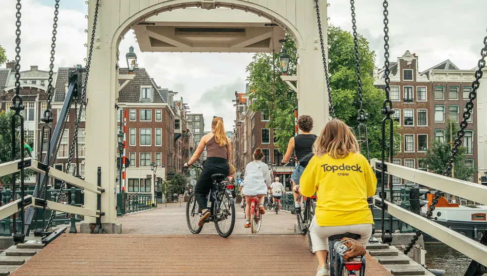 Smaller groups, bigger value: Topdeck’s new small-group travel style is packed with more for your Gen Z clients 3 topdeck amsterdam bike ride