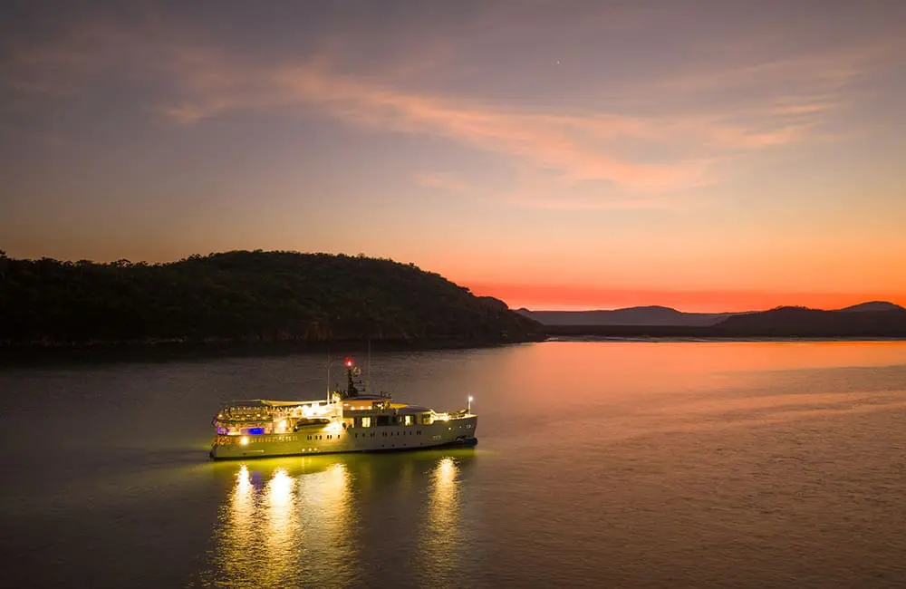 The Kimberley 2026: pick of the ships 4 Paspaley Pearl at sunset ©Pearl Expeditions/Nick Rains