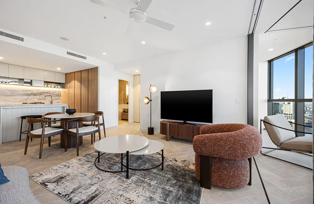Two-Bedroom Premium Skyline View suite living area at Avani Living Queen’s Wharf Residences.