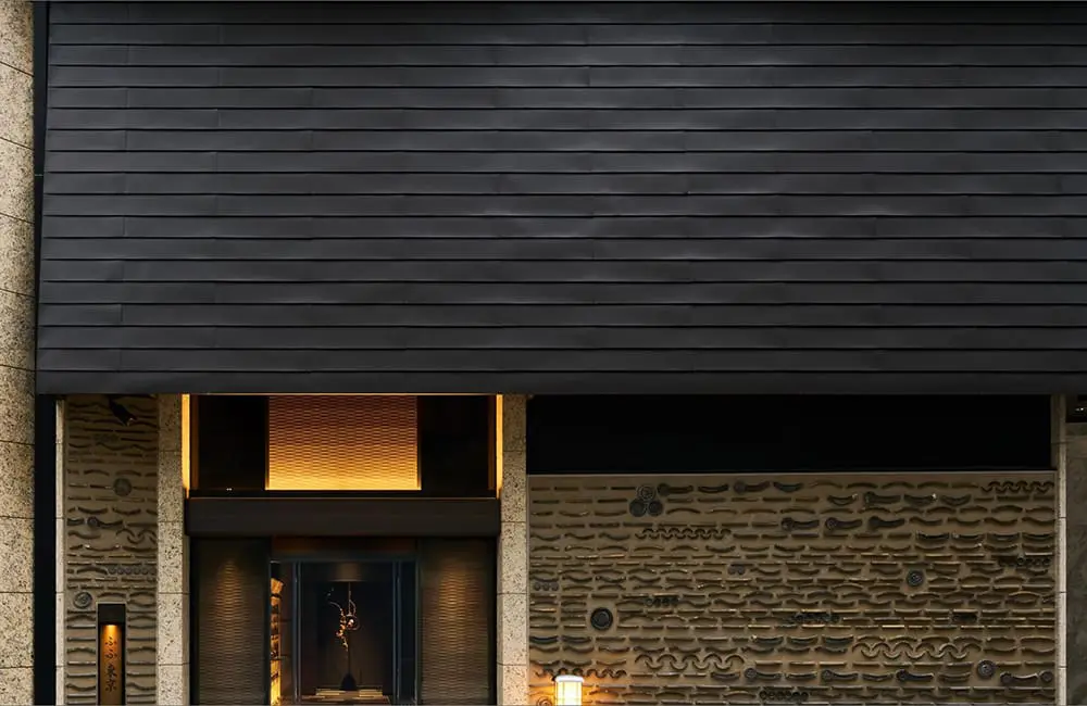 Japan’s most-awarded resort brand FUFU debuts first Tokyo hotel in Ginza 1 FUFU Tokyo Ginza hotel exterior features Japanese volcanic and basalt stones.