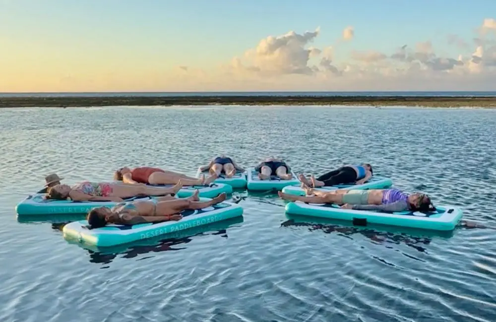Meditating on paddle boards, Tahiti's first yoga festival