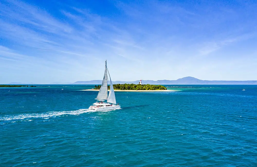 Sailaway VI sailing catamaran at the Low Isles. Image: Sailaway Port Douglas